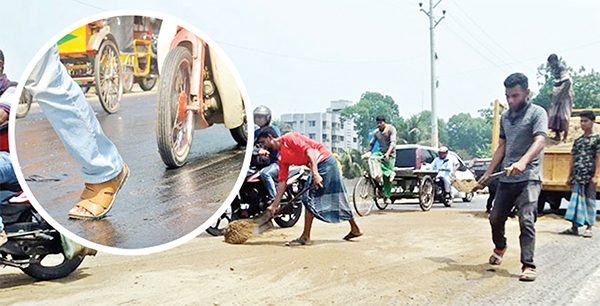 যশোরে দাবদাহে গলছে মহাসড়কের পিচ