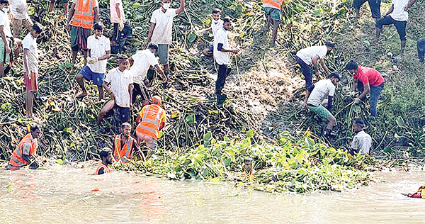 নওগাঁয় তুলসীগঙ্গা নদী পরিষ্কার