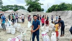 স্বেচ্ছাশ্রমে মেরামত হচ্ছে মেঘনা-ধনাগোদা বেড়িবাঁধ