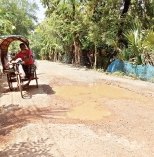 নির্মাণের ২ বছর না যেতেই খানাখন্দে বেহাল সড়ক  